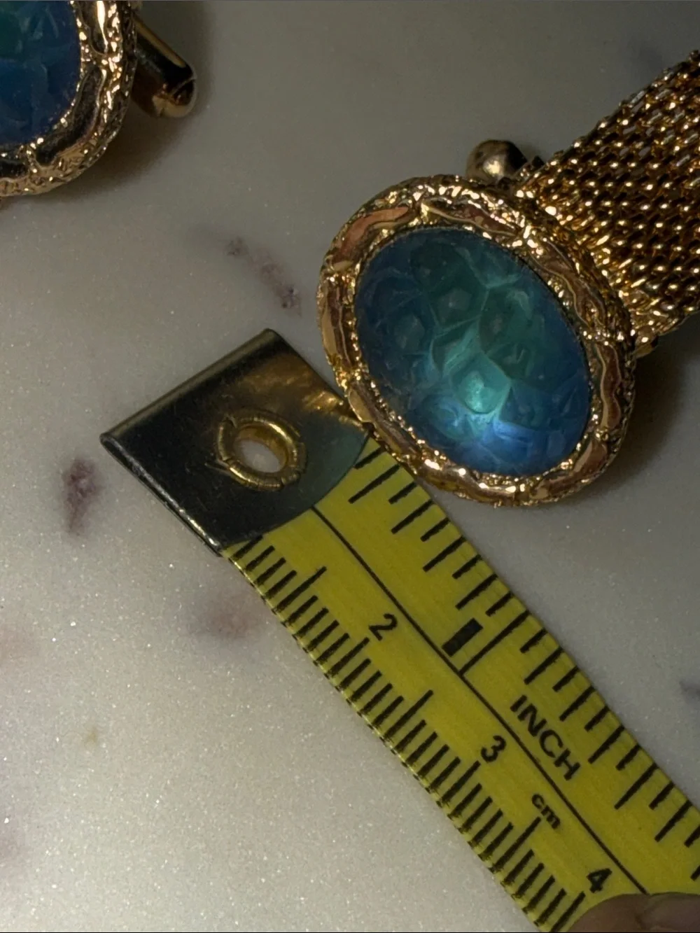 Gold-Tone Cufflinks with Blue-Green Faceted Inset